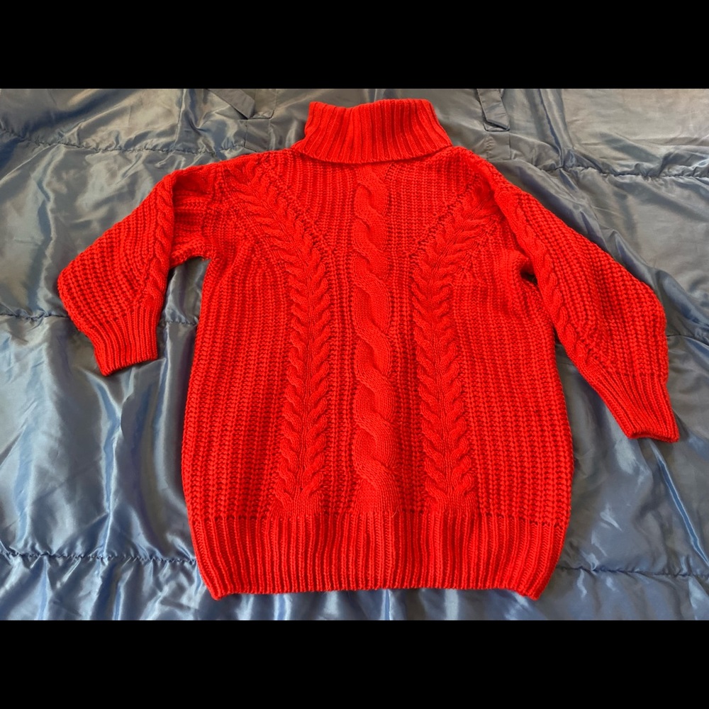 Red cable knit turtleneck